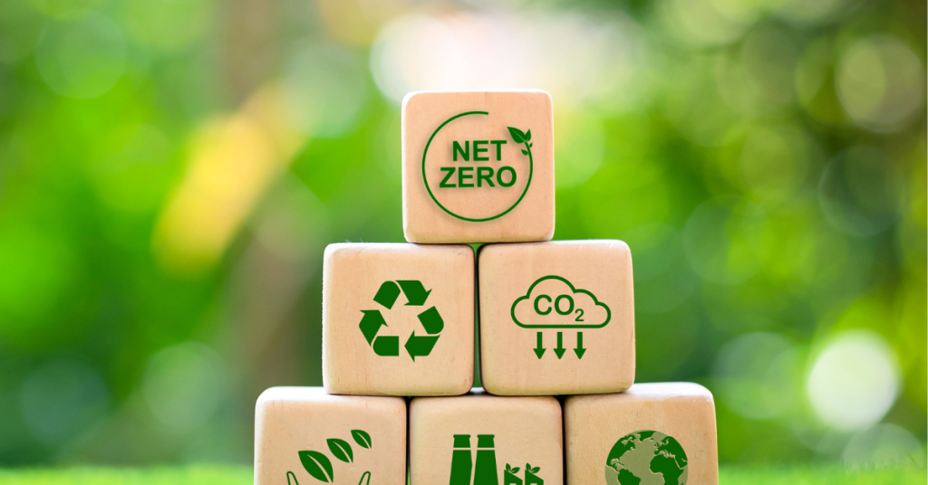 Dice with sustainability icons on green background